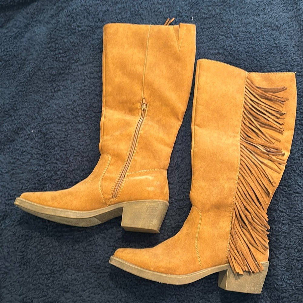 Tan tall boots with fringe